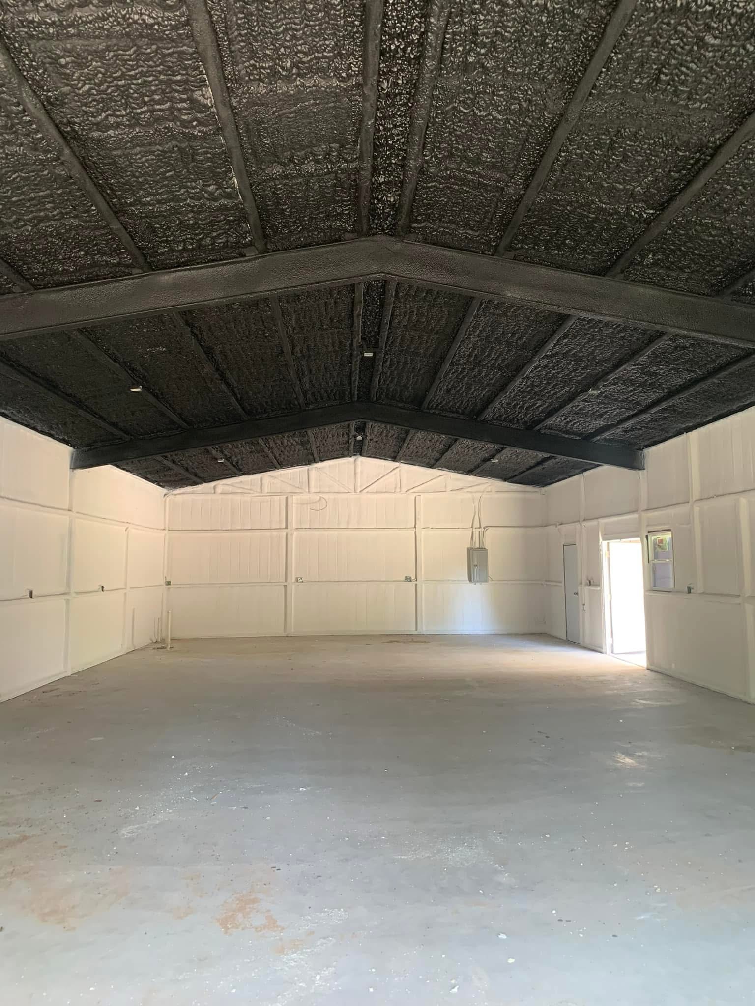 Completed closed cell spray foam insulation on metal building ceiling and walls in Oklahoma